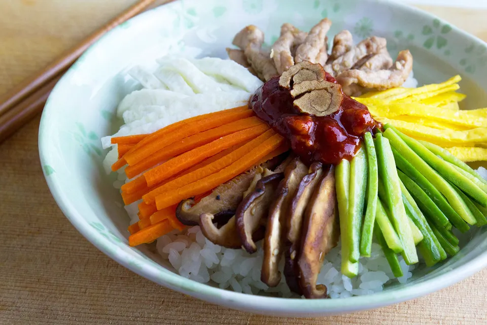 Bibimbap with vegetables and a fried egg